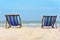 Two canvas chairs on the beach background. On white sand and blue sea so beautiful and relax  view