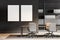 Two canvases on wall of dark grey meeting room with shelving