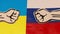 two cardboard fists on flags of Russia and Ukraine. Russian versus Ukraine trade third world war disputes and anctions