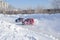 Two cars compete at the turning the track