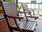 Two Carved Wooden Chairs at The Porch