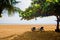 Two chairs on a beautiful sandy beach.