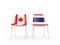 Two chairs with flags of Canada and thailand