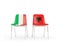 Two chairs with flags of Italy and albania