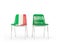 Two chairs with flags of Italy and saudi arabia