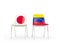 Two chairs with flags of Japan and venezuela isolated on white