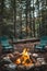 Two chairs sitting around a fire pit in the woods, AI