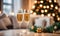 Two champagne glasses in festive Christmas ambiance