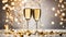 Two champagne glasses with golden confetti over illuminated background