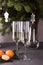 Two champagne glasses, Merry Christmas fir branchs, candles, card for new year greeting