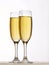 Two champagne glasses in toast