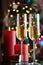 Two champagner glasses on glass table with bokeh background