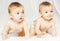 Two charming twins babies crawling