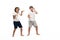 Two cheerful brothers listening music in headphones and dancing