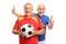 Two cheerful elderly soccer players with football and thumbs up