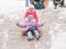 Two cheerful girls ride a roller coaster of ice