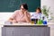 Two chemists students in classroom