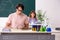 Two chemists students in classroom