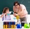 Two chemists students in classroom