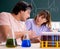 Two chemists students in classroom