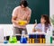 Two chemists students in classroom