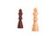 Two chess pieces. Black and white king of wood with blurred background - Isolated on white