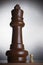 Two chess pieces large king and small pawn