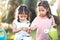 Two children asian girl plant seedling young tree