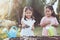 Two children asian little girl having fun to prepare soil