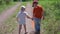 Two children caught fish. The boys are on a forest trail with a catch. Beautiful summer landscape. Outdoor recreation.