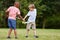 Two children fighting as pirates