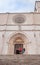 Two children look at the front of the Annunciation Cathedral of