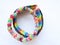 Two children s bright wicker bracelets from multi-colored little erasers isolated object on a white background