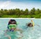 Two children snorkeling