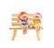 Two children statue to happy and smile , sitting on the wooden c