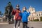 Two children wearing a mask on the street