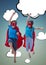 Two children wearing superhero costume enjoying against sky background