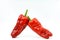 two chilis stay with each other on the white background