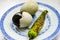 Two Chinese Century Eggs and Green Chili on Plate