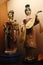 Two chinese decorative figures of women, female musician holding Pipa and second one, possibly dancer or actor, holding decorative