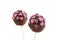 Two chocolate cakepops with hearts decoration