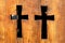 Two christian orthodox crosses carved in wood. Religoous wooden sculpture