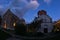 Two churches inside Studenica monastery during evening prayer