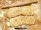 Two ciabatta bread loaf fresh bake close up photo on kitchen board