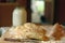 Two ciabatta bread loaf fresh bake close up photo on kitchen board