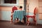 Two classic style chairs and table outdoors