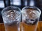 Two cold water glass with ice cubes, Water drops, Close up & Macro shot, Selective focus, Healthy Drink concept