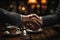 Two colleagues in a firm handshake sealing a partnership, business meeting image