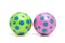 Two colorful dotted balls