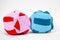 Two colorful soft textile washable snuffle toy balls with special holes inside for treats for dog nose work, close up